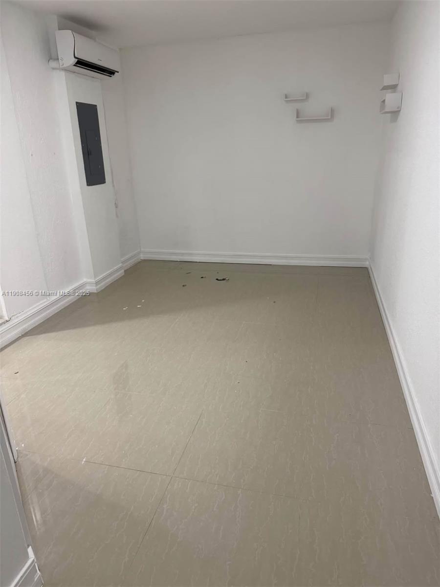 965 Southwest 153rd Path Miami, FL 33194 - Photo 18 of 27 an empty room with a window