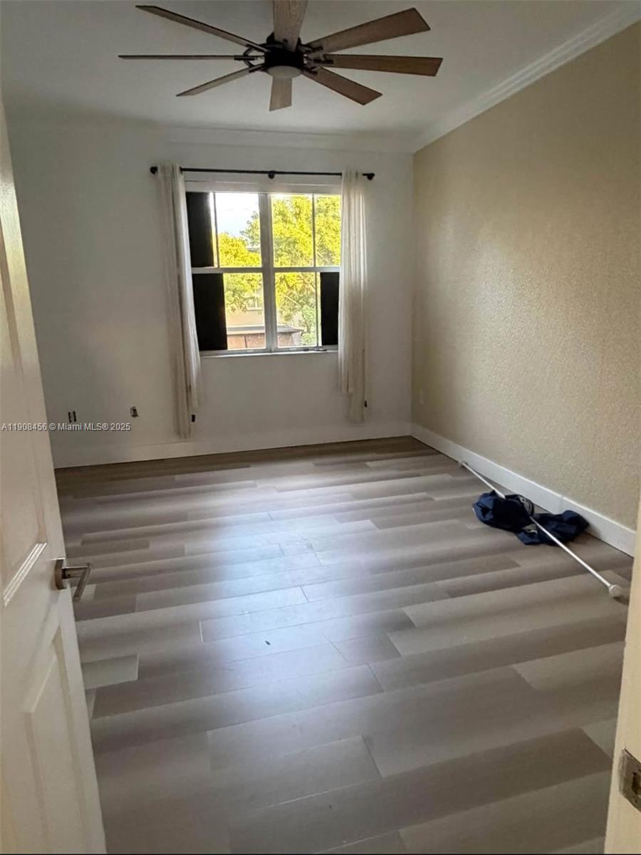 965 Southwest 153rd Path Miami, FL 33194 - Photo 21 of 27 a view of an empty room and window