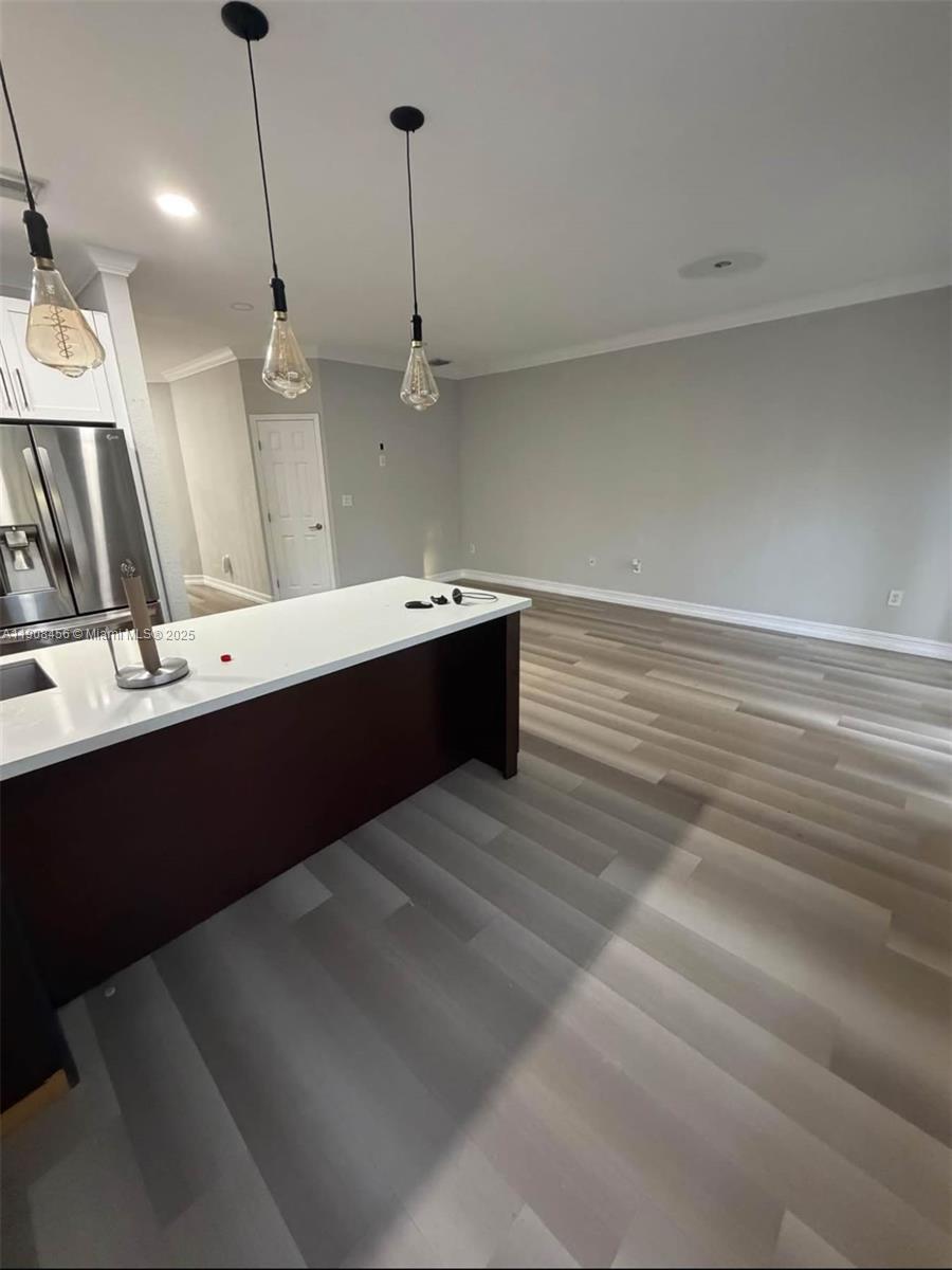 965 Southwest 153rd Path Miami, FL 33194 - Photo 9 of 27 a room with a sink and mirror