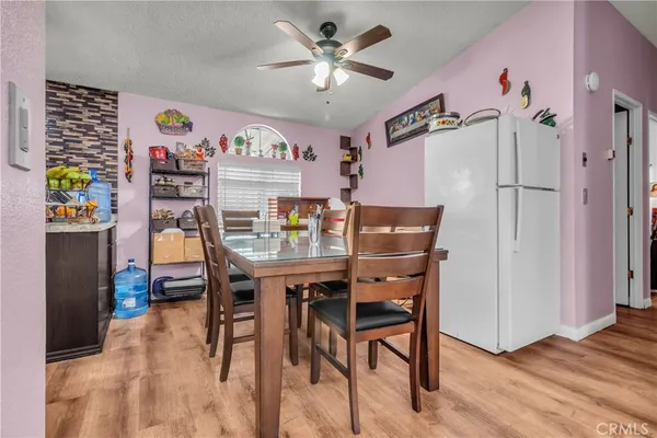 a view of a dining room with furniture