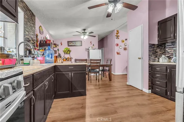 a kitchen with granite countertop lots of counter top space