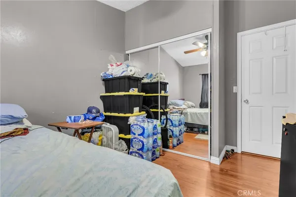 a bed room with a bed and a window