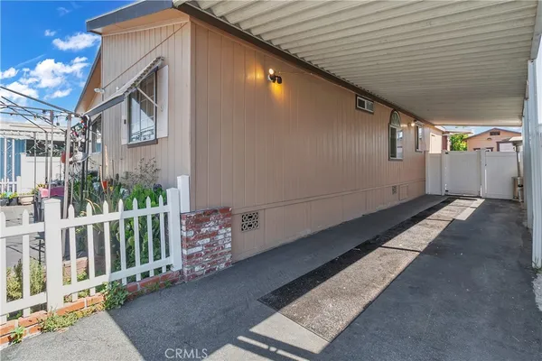 a view of a house with a street
