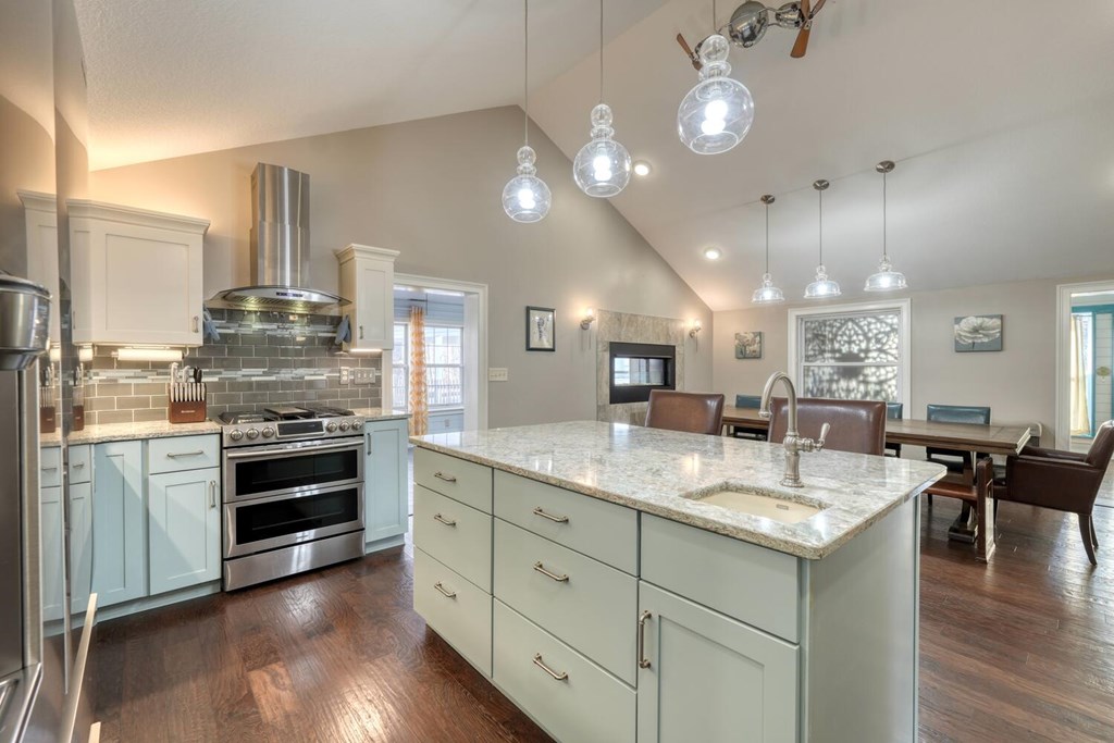 3035 Skeenah Gap Road Suches, GA 30572 - Photo 11 of 33 a kitchen with stainless steel appliances granite countertop a stove and a wooden floors