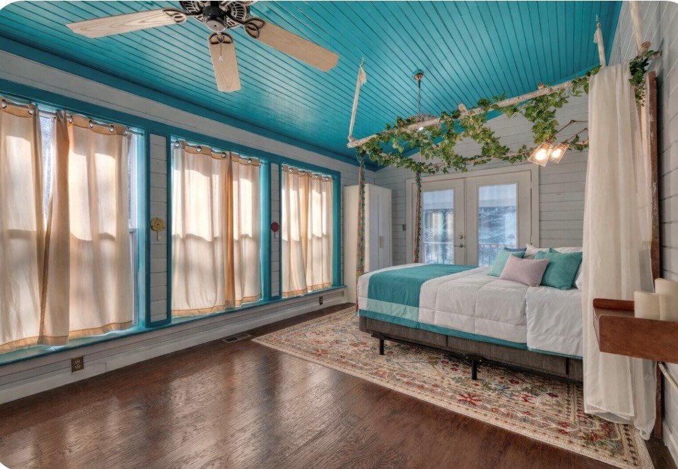 3035 Skeenah Gap Road Suches, GA 30572 - Photo 23 of 33 a spacious bedroom with a bed and a large window