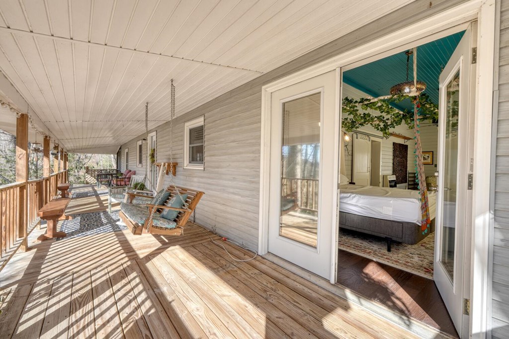 3035 Skeenah Gap Road Suches, GA 30572 - Photo 27 of 33 a balcony with furniture and a potted plant