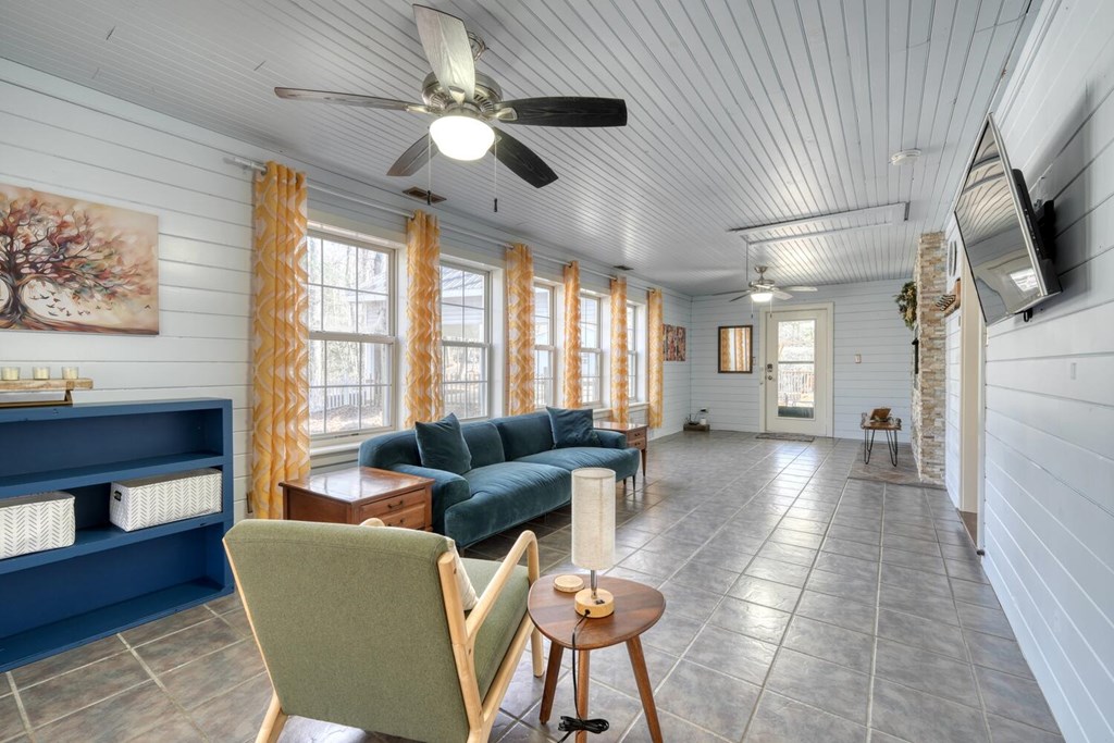 3035 Skeenah Gap Road Suches, GA 30572 - Photo 8 of 33 a living room with furniture a fireplace and a flat screen tv