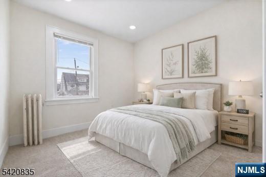 39 Hurden Street Hillside, NJ 07205 - Photo 11 of 20 a bedroom with a bed and a window