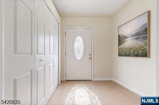 39 Hurden Street Hillside, NJ 07205 - Photo 3 of 20 a view of a livingroom with wooden floor and window