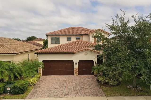 a front view of a house with yard