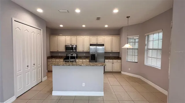 a outdoor space with lots of tables and chairs