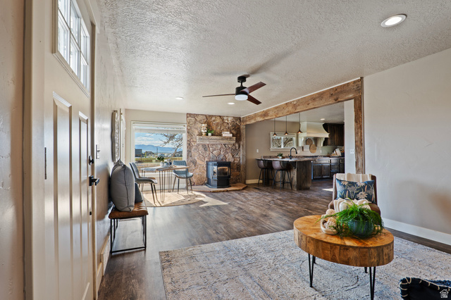 115 East 1600th Street North Santaquin, UT 84655 - Photo 19 of 52 Open-concept living area with wood-finish flooring, recessed lighting, and a ceiling fan