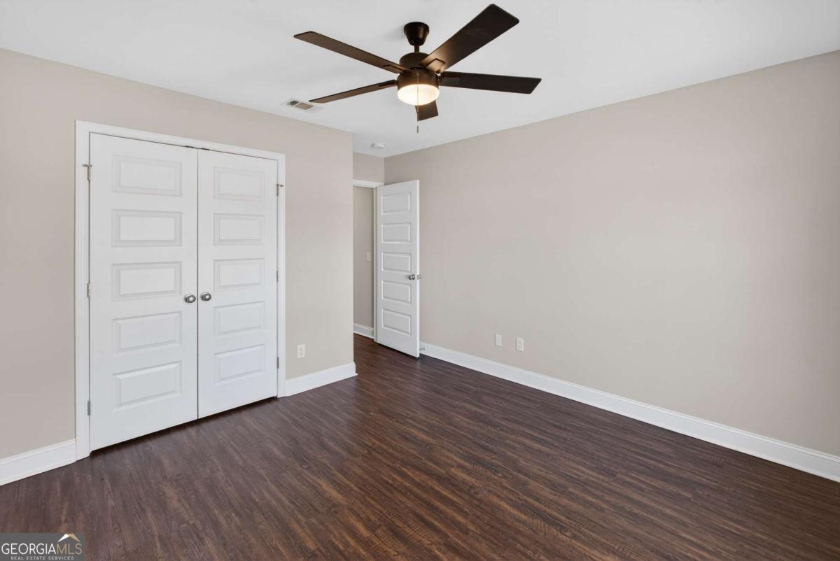303 Tallulah Bend Ellabell, GA 31308 - Photo 34 of 48 wooden floor in an empty room