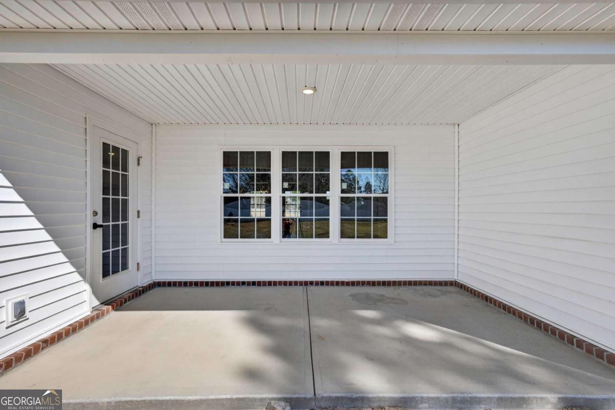 303 Tallulah Bend Ellabell, GA 31308 - Photo 42 of 48 a view of front door