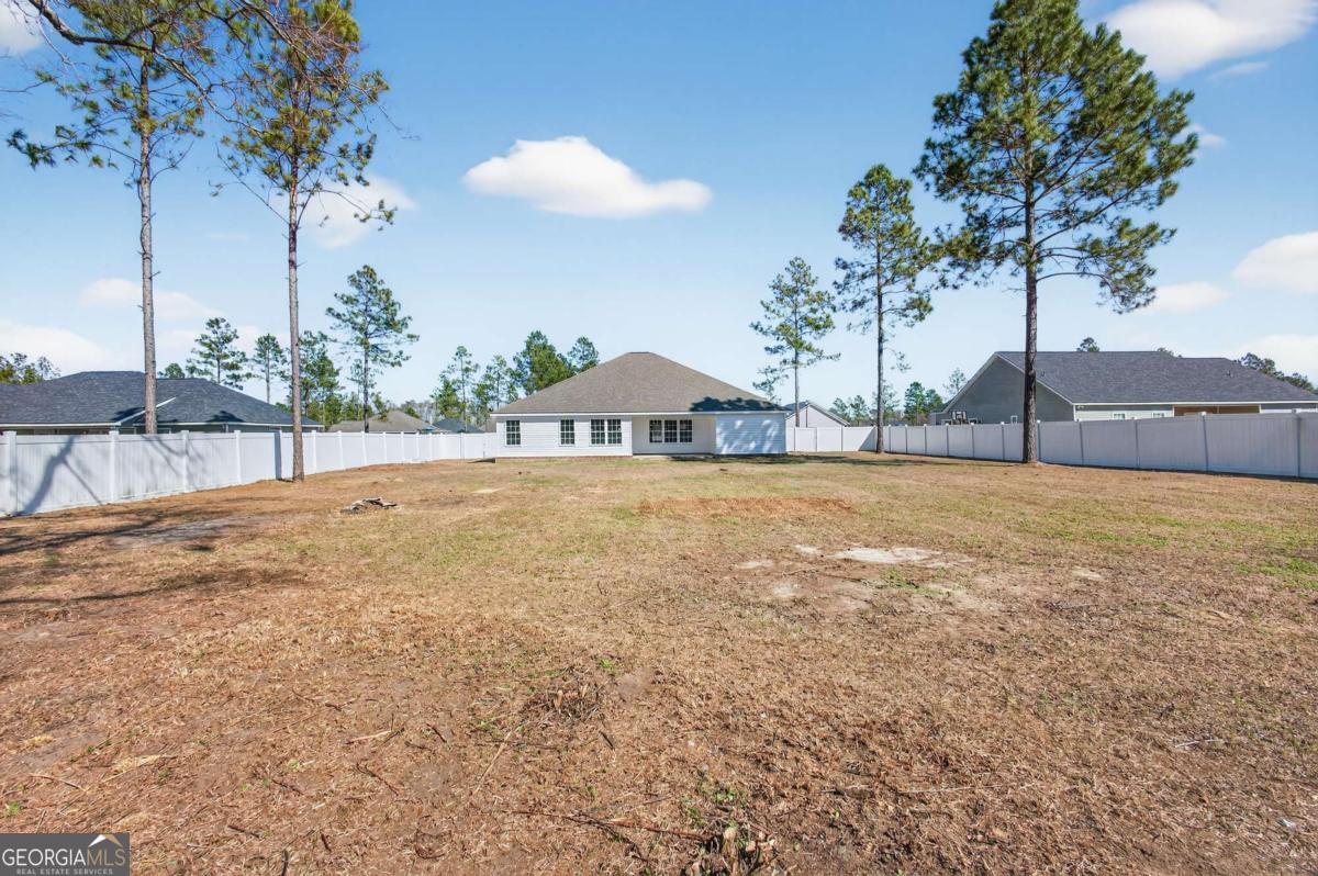 303 Tallulah Bend Ellabell, GA 31308 - Photo 44 of 48 a view of pool and outdoor space