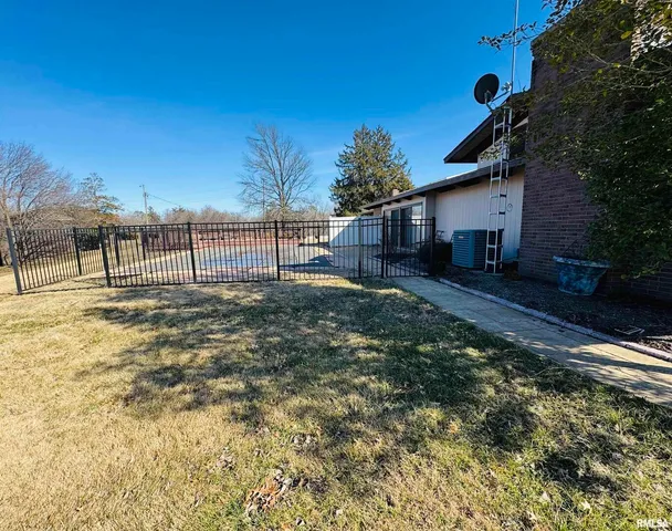 a black and white house with outdoor space