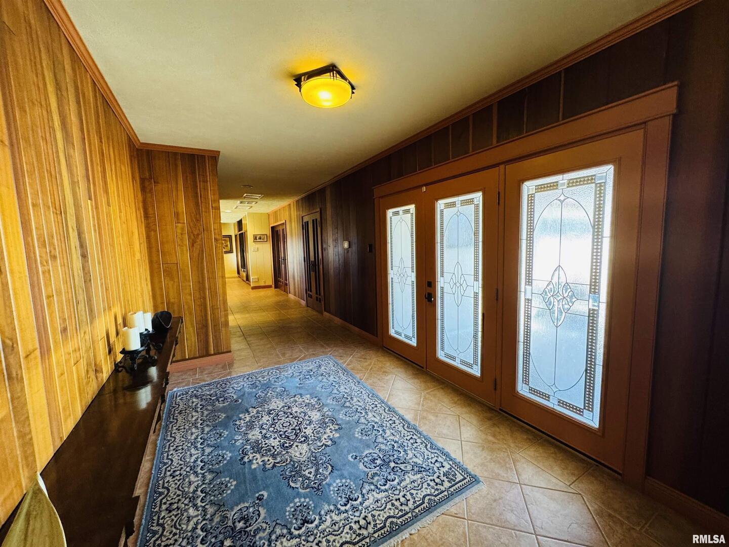 800 South Green Street Anna, IL 62906 - Photo 19 of 44 a view of a hallway with wooden floor and front door