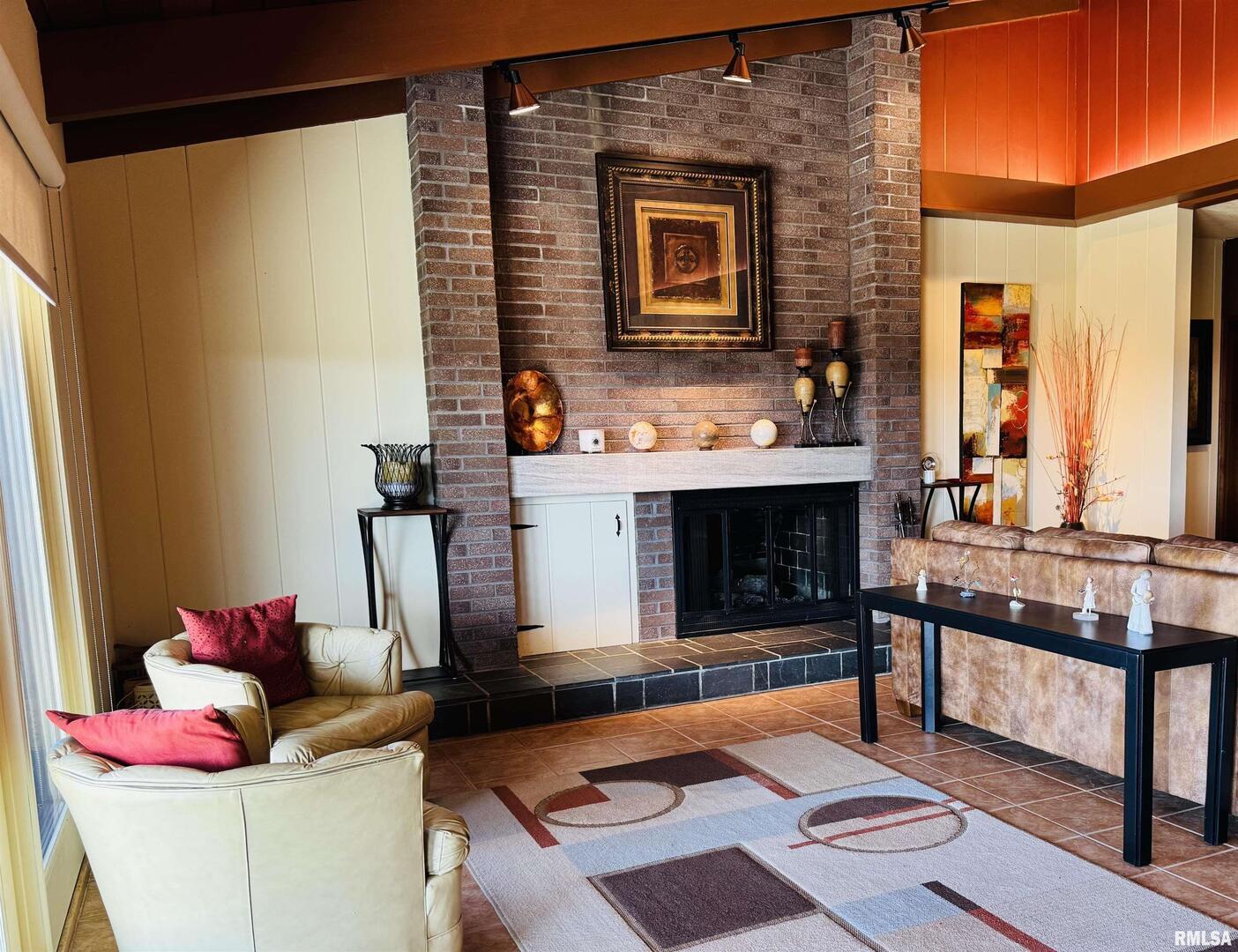 800 South Green Street Anna, IL 62906 - Photo 21 of 44 a living room with furniture and a fireplace