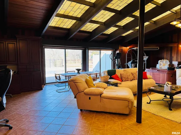 a view of sunset and green space