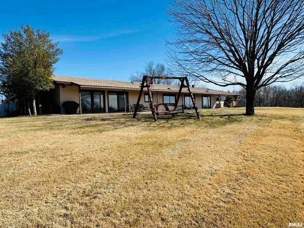a view of a house with a park