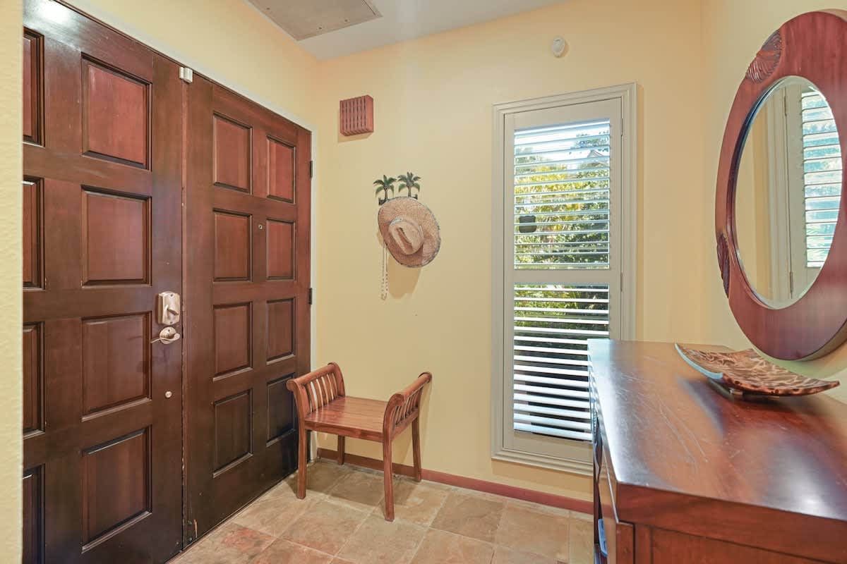 366 Papaloa Road, Unit 114 Kapaa, HI 96746 - Photo 6 of 23 a view of a livingroom with furniture and windows