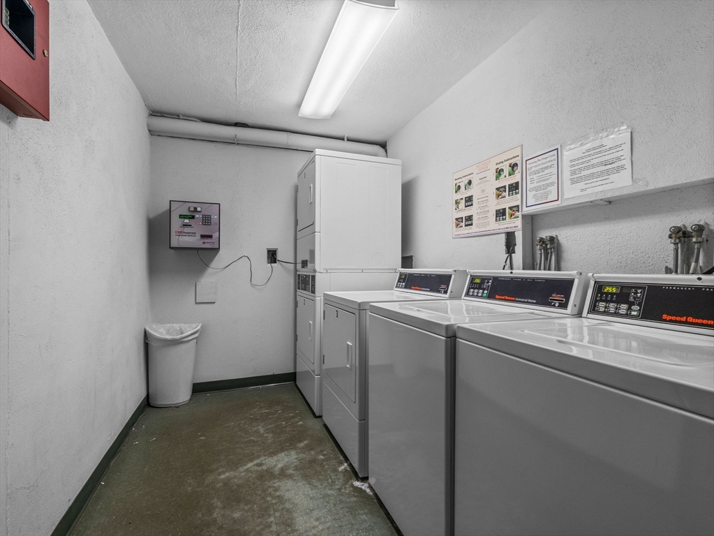 48 Great Road, Unit 13 Acton, MA 01720 - Photo 9 of 12 a room with a sink and toilet