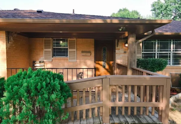 front view of a house with a small yard