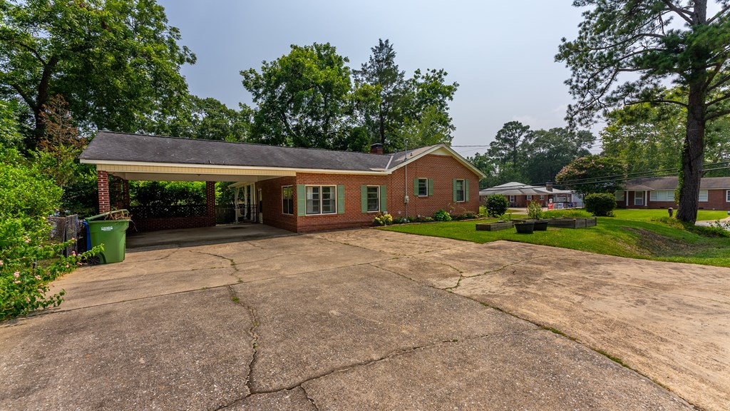 5352 Moon Road Columbus, GA 31909 - Photo 2 of 50 a front view of a house with garden