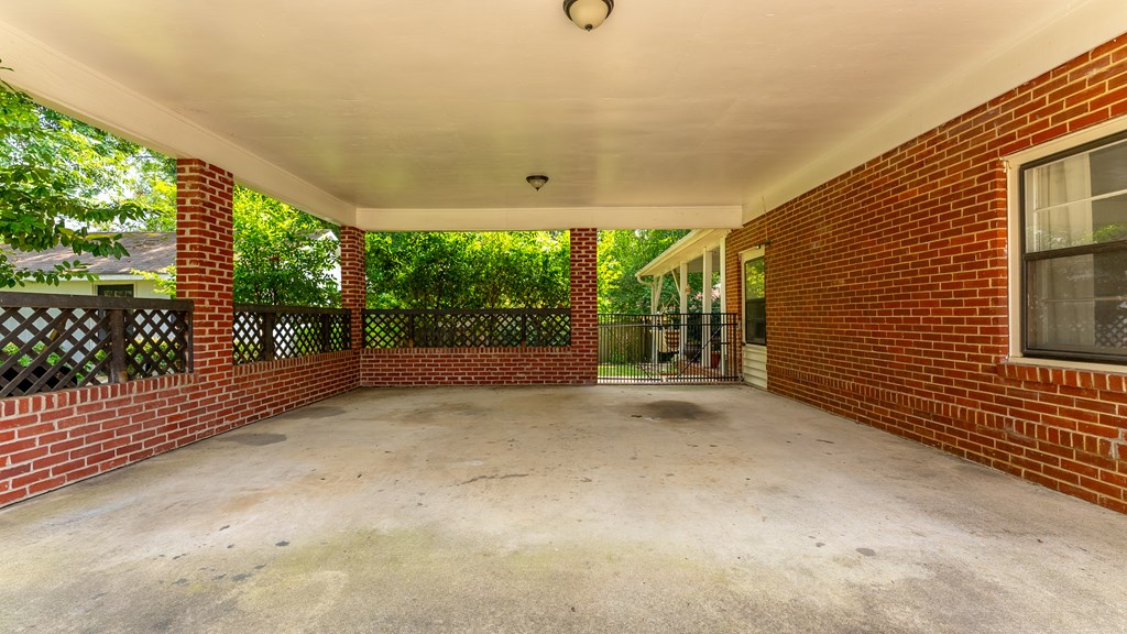 5352 Moon Road Columbus, GA 31909 - Photo 4 of 50 a view of a porch with wooden floor