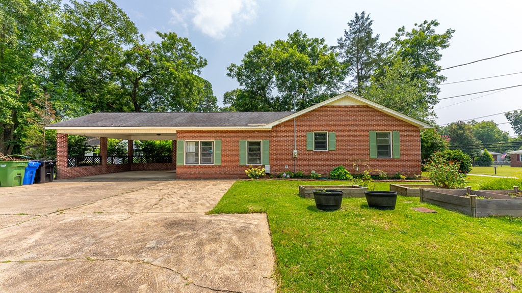 5352 Moon Road Columbus, GA 31909 - Photo 6 of 50 a front view of a house with garden