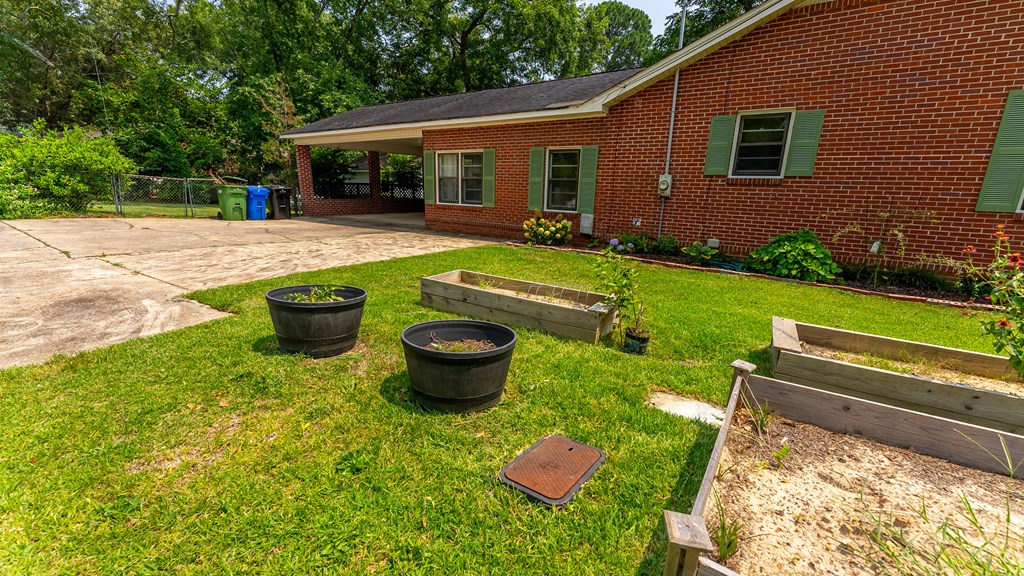5352 Moon Road Columbus, GA 31909 - Photo 8 of 50 a view of a house with backyard and sitting area