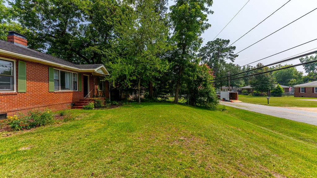 5352 Moon Road Columbus, GA 31909 - Photo 10 of 50 a front view of house with yard and green space