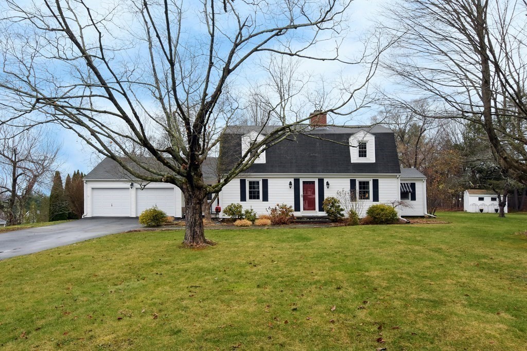 45 McGregory Road Sturbridge, MA 01566 - Photo 1 of 36 a house that has a tree in front of it