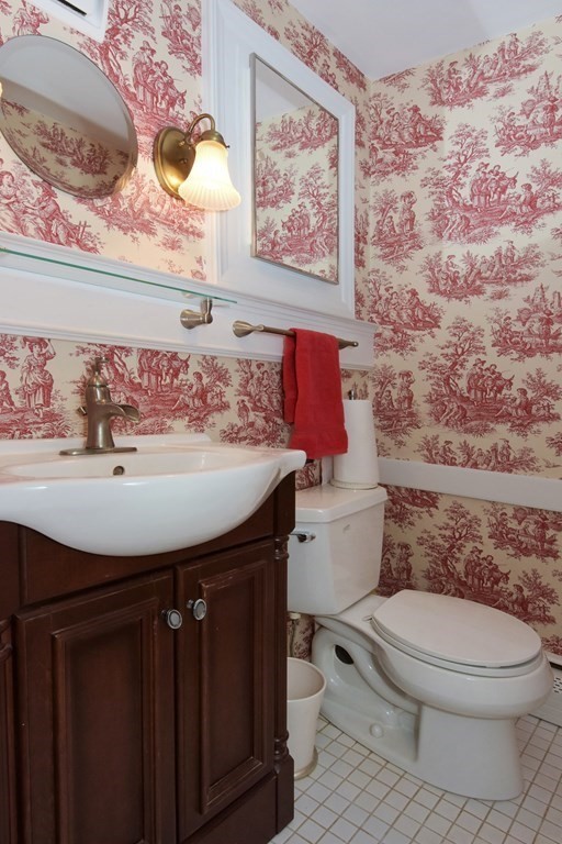 45 McGregory Road Sturbridge, MA 01566 - Photo 20 of 36 a bathroom with a sink and a toilet