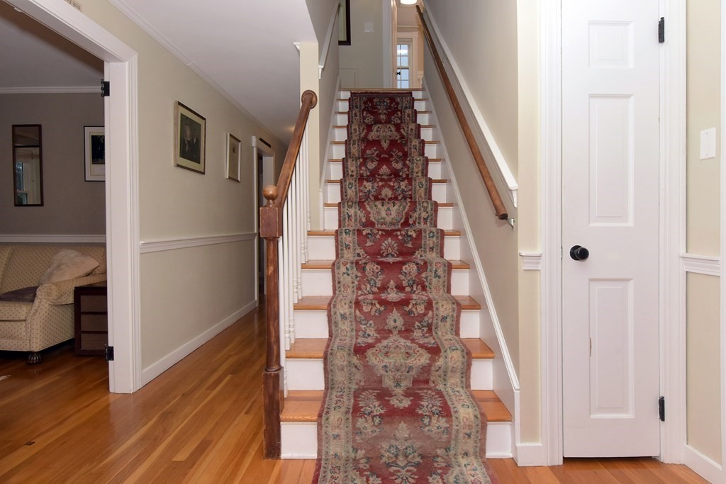 45 McGregory Road Sturbridge, MA 01566 - Photo 23 of 36 a view of a hallway with wooden floor and entryway