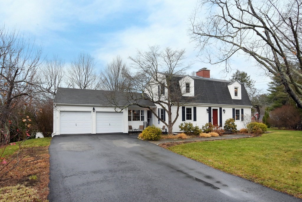 45 McGregory Road Sturbridge, MA 01566 - Photo 3 of 36 a front view of house with yard and trees around
