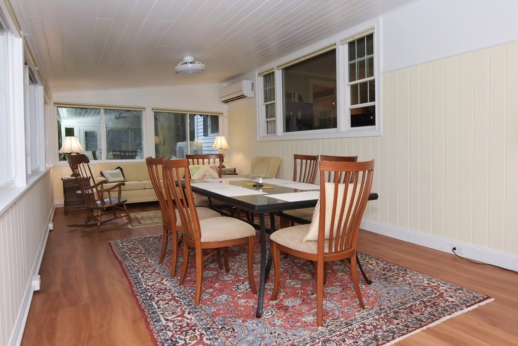 45 McGregory Road Sturbridge, MA 01566 - Photo 8 of 36 a dining room with furniture and wooden floor
