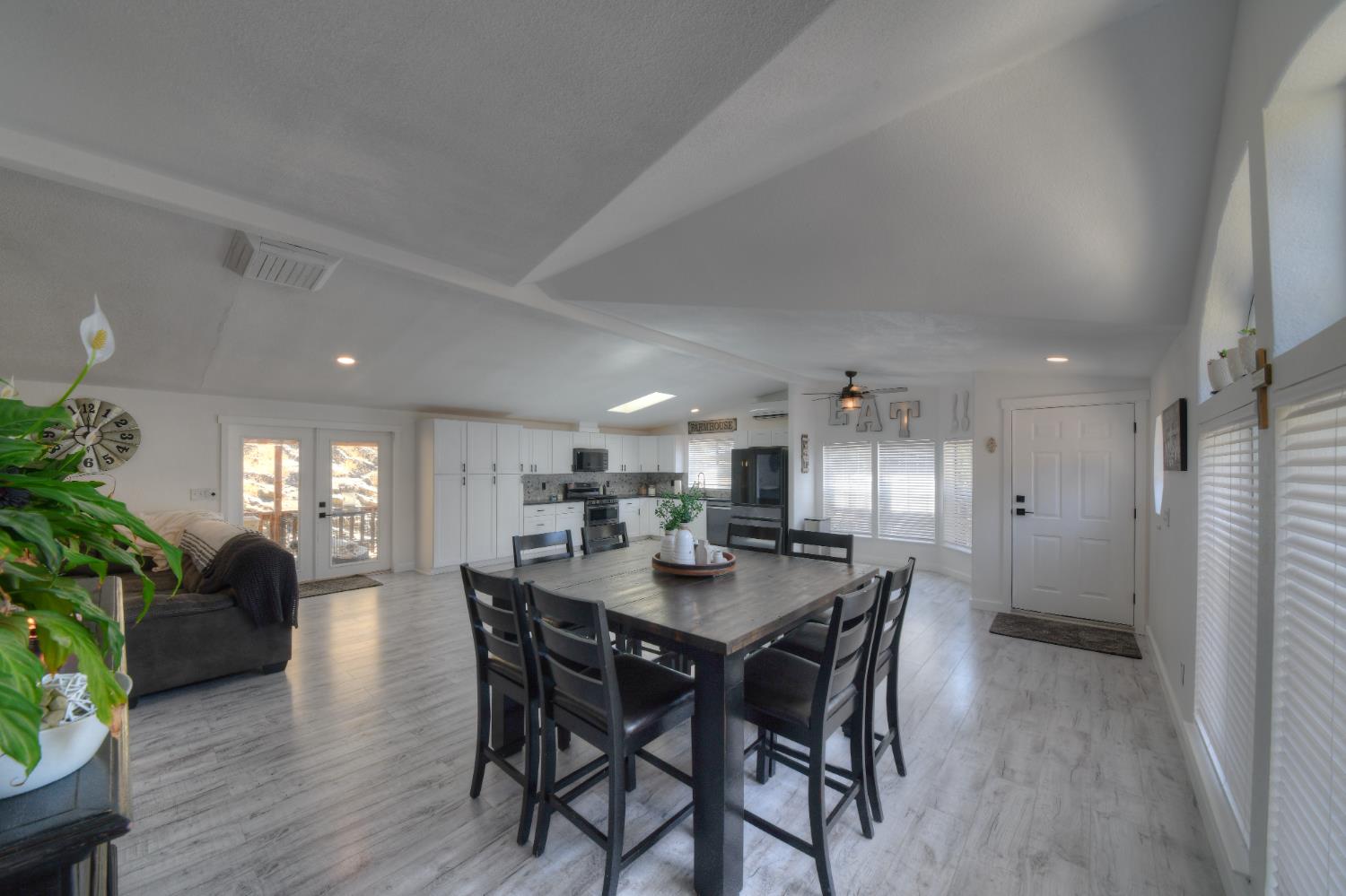 17045 Table Mountain Road Jamestown, CA 95327 - Photo 15 of 59 a kitchen with a table and chairs in it