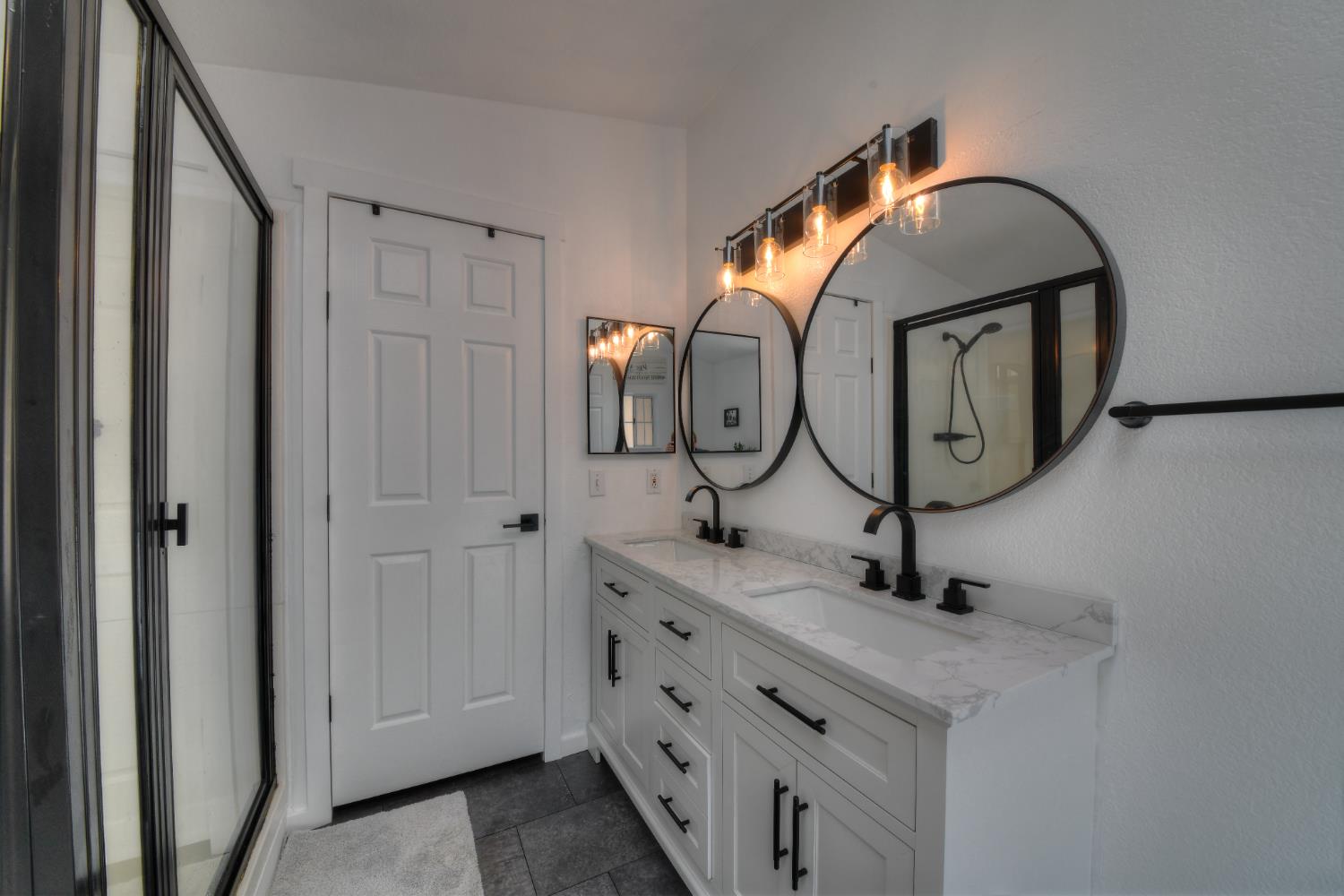 17045 Table Mountain Road Jamestown, CA 95327 - Photo 31 of 59 a bathroom with a sink and a mirror