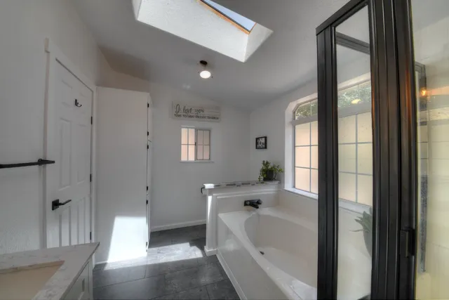 a view of balcony with wooden floor and fence