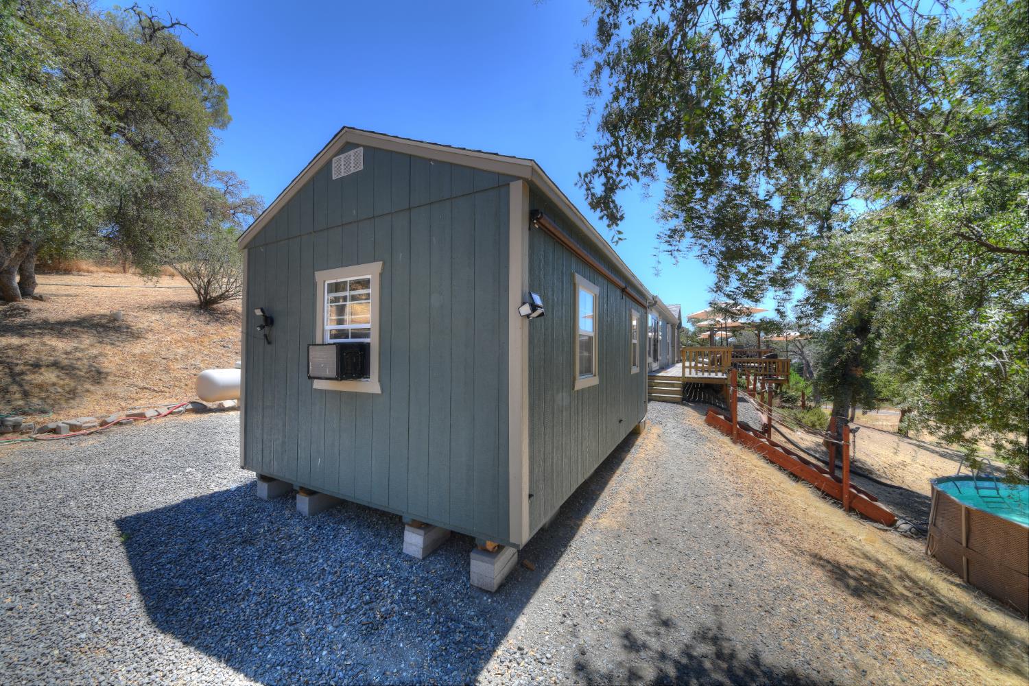 17045 Table Mountain Road Jamestown, CA 95327 - Photo 41 of 59 a view of a house with a yard