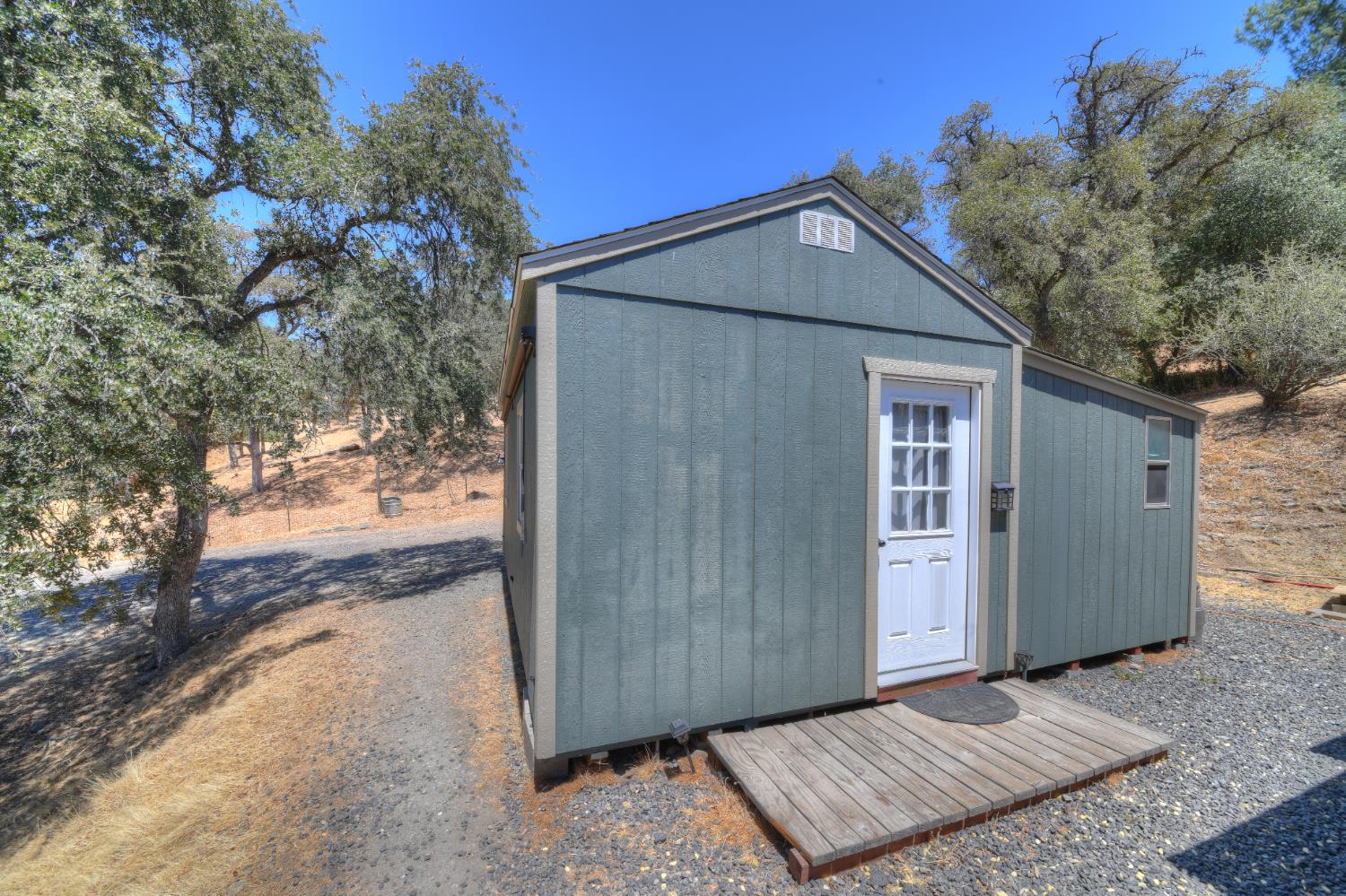 17045 Table Mountain Road Jamestown, CA 95327 - Photo 42 of 59 a view of a house with a yard