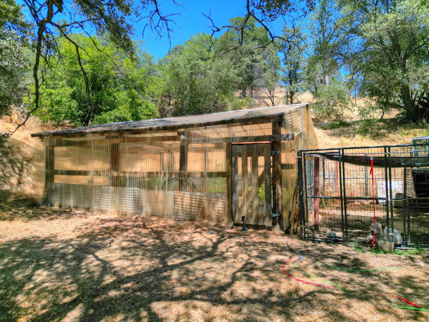 17045 Table Mountain Road Jamestown, CA 95327 - Photo 56 of 59 a view of a house with backyard