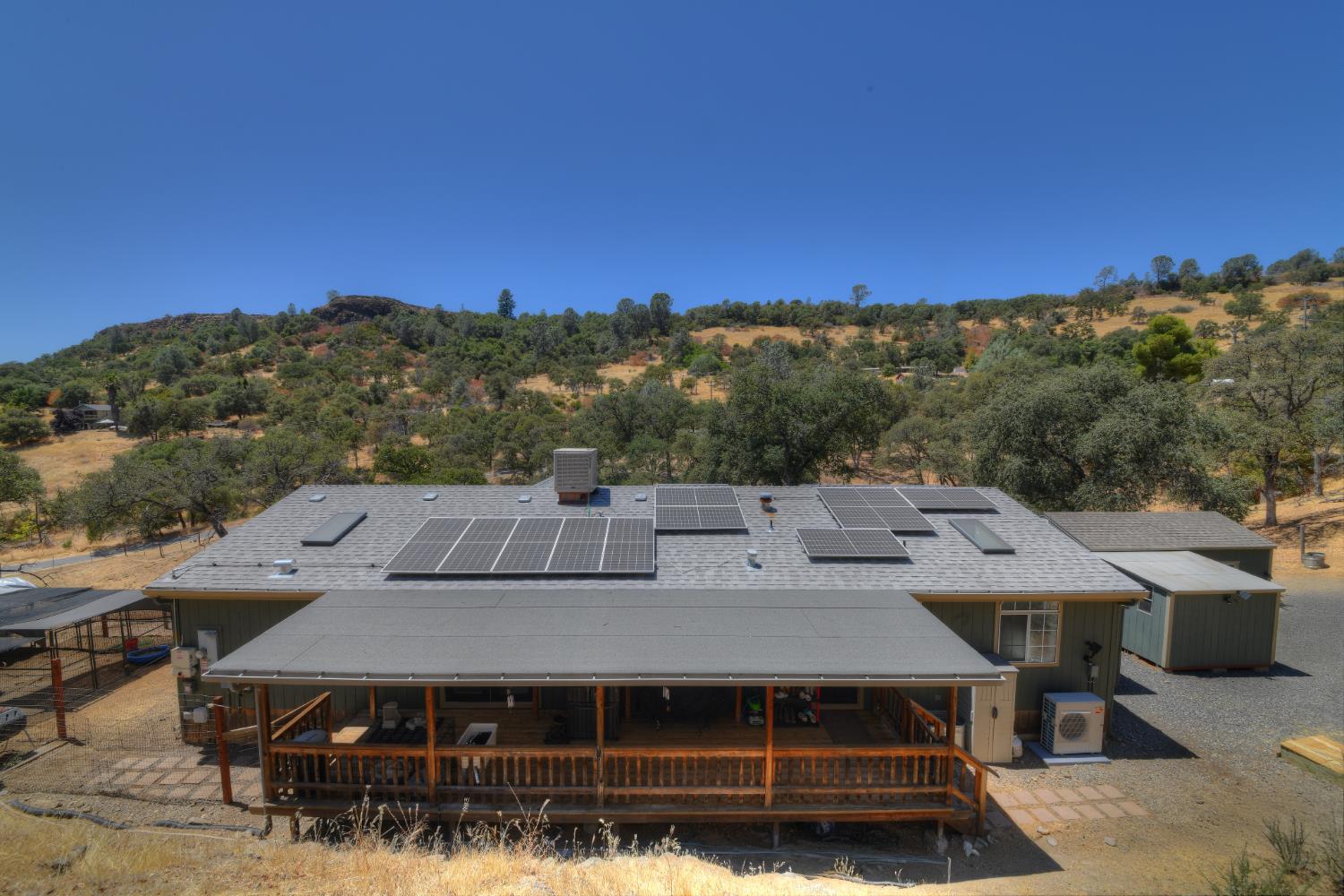 17045 Table Mountain Road Jamestown, CA 95327 - Photo 59 of 59 a view of a big house with a mountain in the background