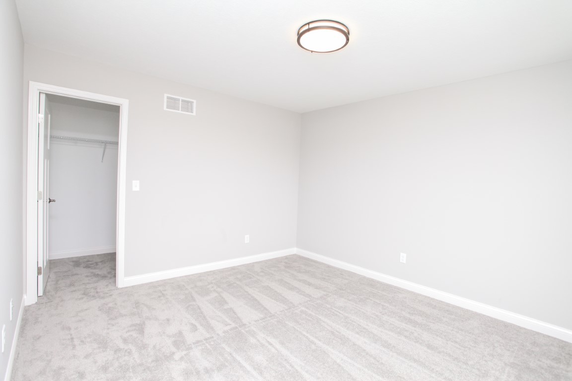 511 Bobwhite Way Normal, IL 61761 - Photo 29 of 39 a view of a small space with wooden floor