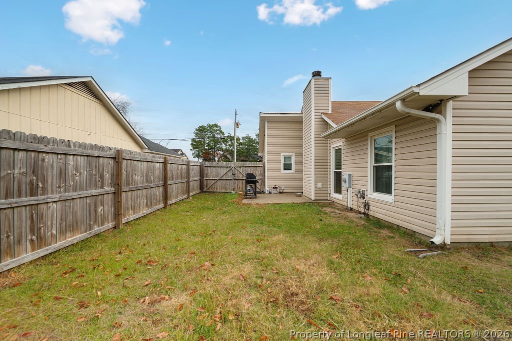 3446 Legion Road Hope Mills, NC 28348 - Photo 21 of 22 a view of a backyard