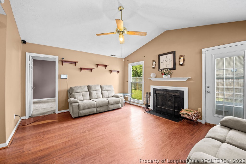 3446 Legion Road Hope Mills, NC 28348 - Photo 3 of 22 a living room with furniture and a fireplace
