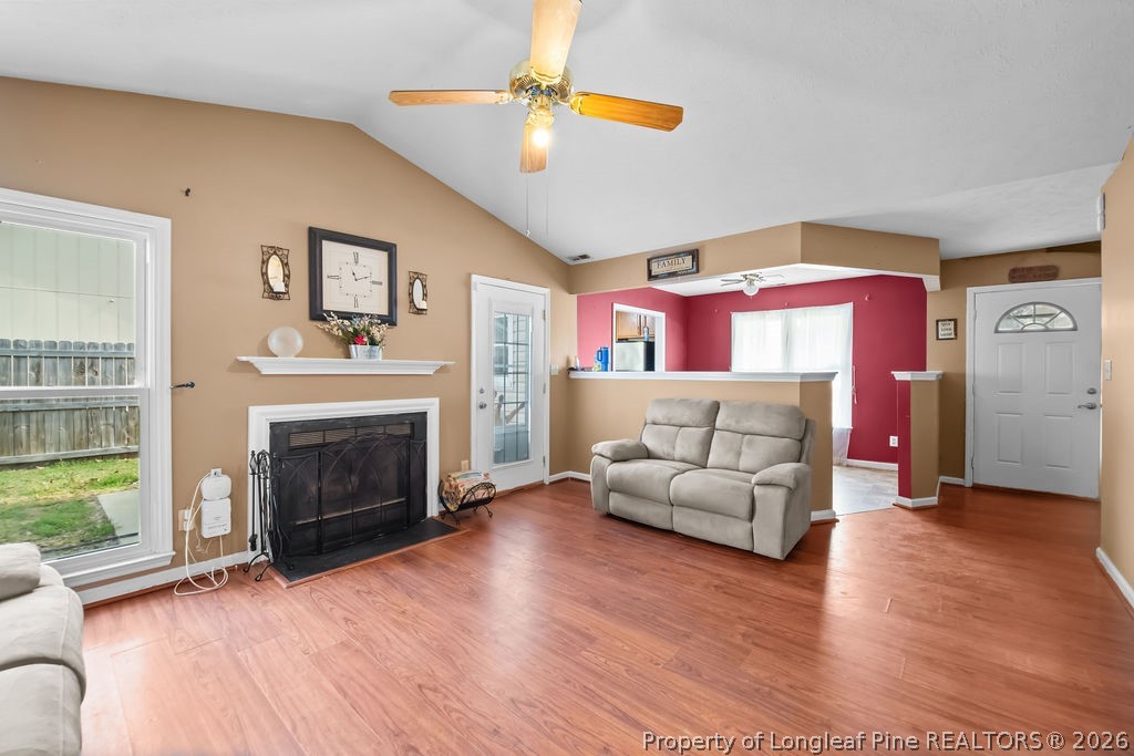 3446 Legion Road Hope Mills, NC 28348 - Photo 4 of 22 a living room with furniture and a fireplace