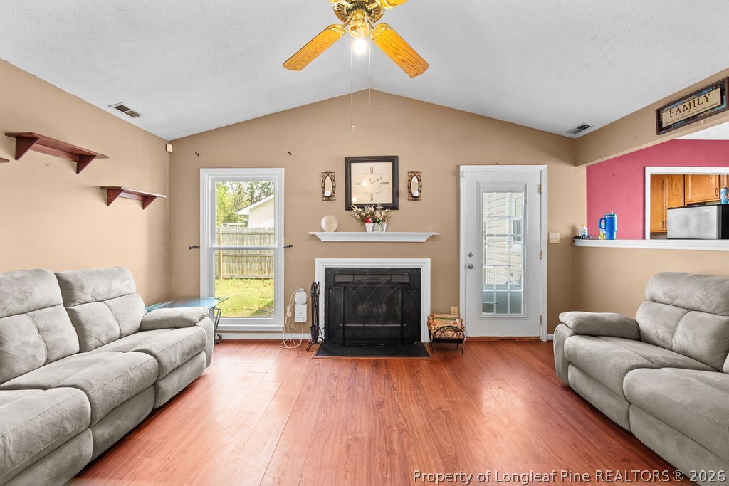 3446 Legion Road Hope Mills, NC 28348 - Photo 5 of 22 a living room with furniture and a fireplace
