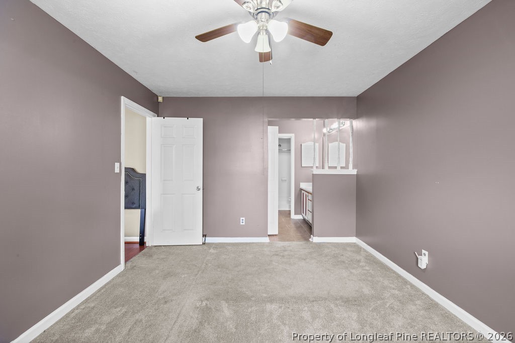 3446 Legion Road Hope Mills, NC 28348 - Photo 9 of 22 a view of an empty room with a window